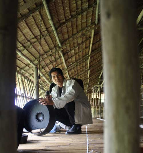 Artist Jainal Amambing photographed in a traditional longhouse in his native Sabah, Borneo, Malaysia